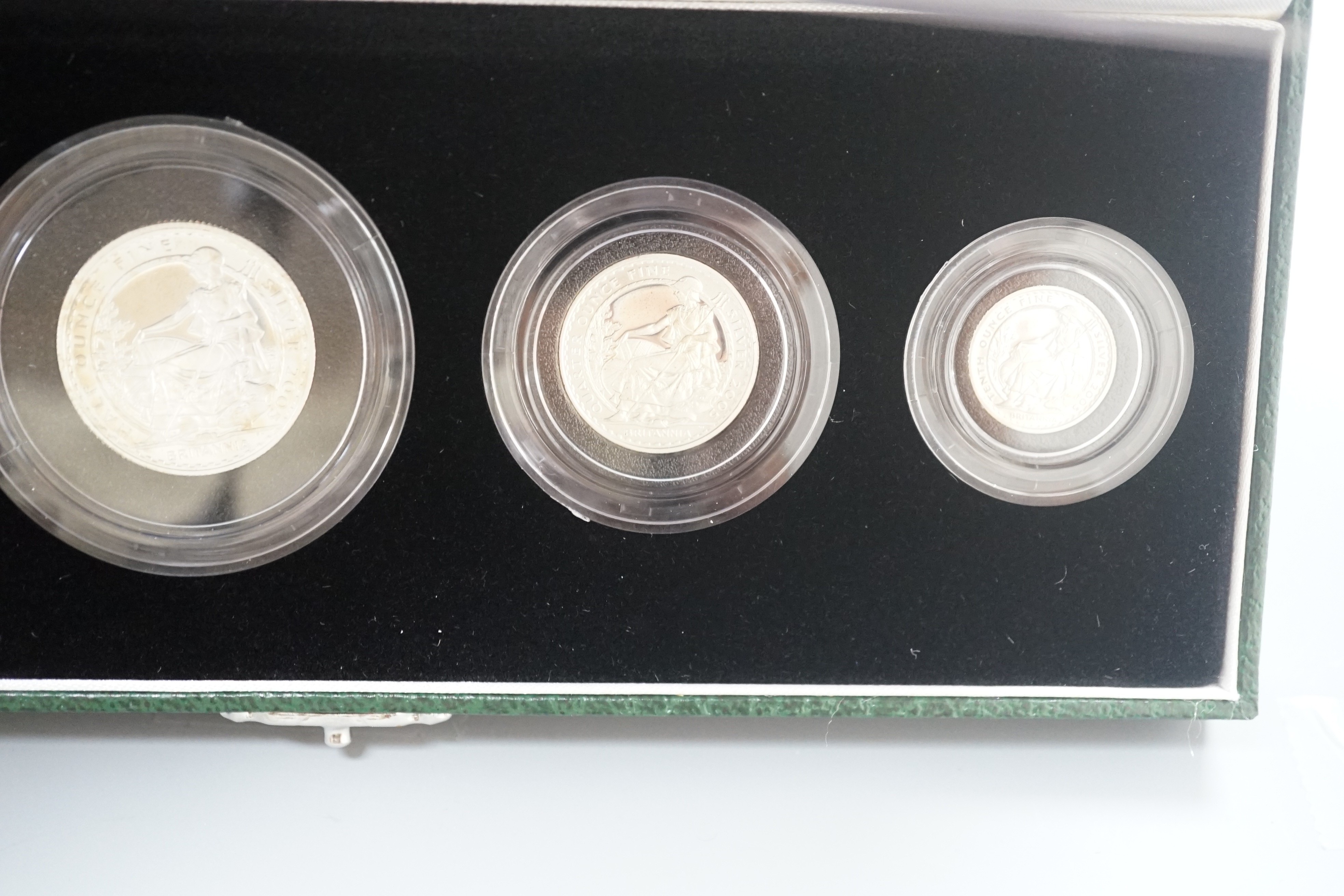 Two cased Royal Mint Britannia silver proof four coin sets, 2005 and 2008, 20p to £2